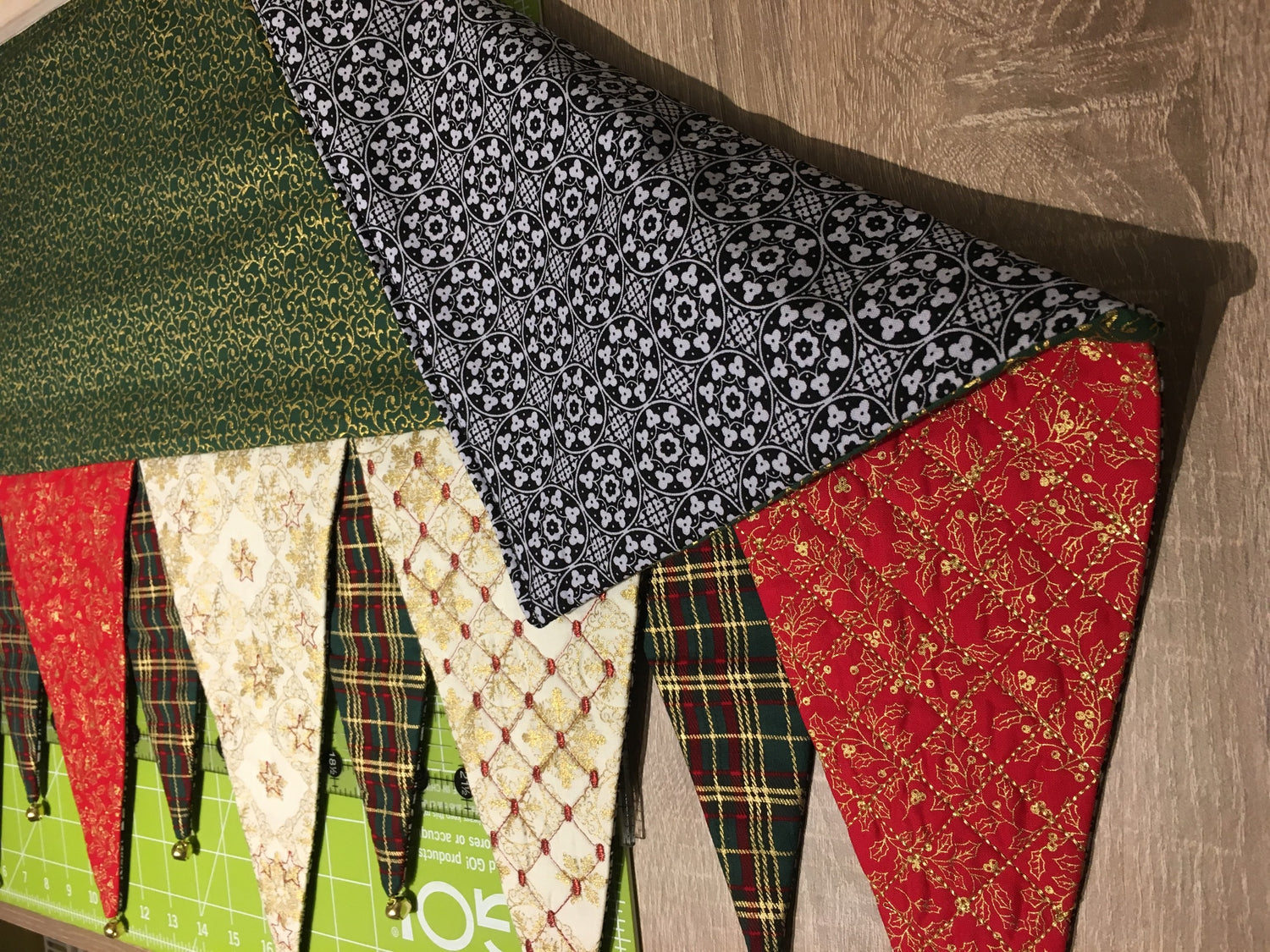 Jingle all the way with this Christmas Mantel Runner made in the hoop, machine embroidery design