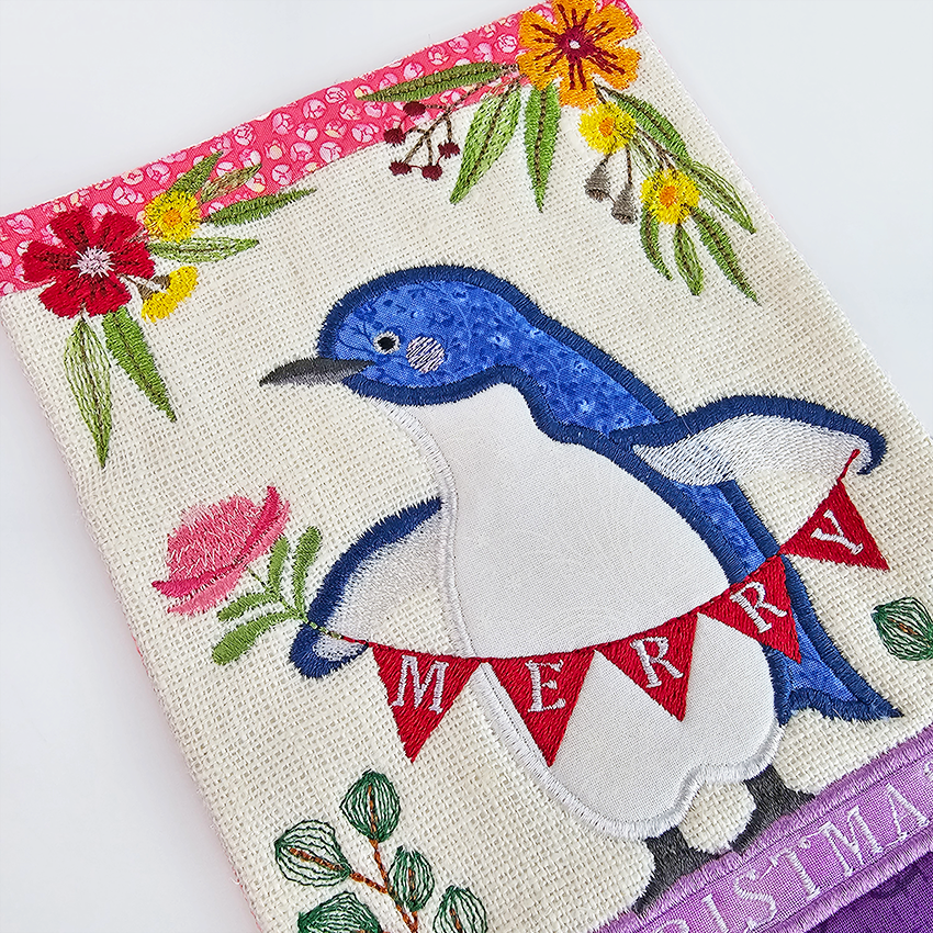 Christmas Little Penguin Mug Rug free machine embroidery design