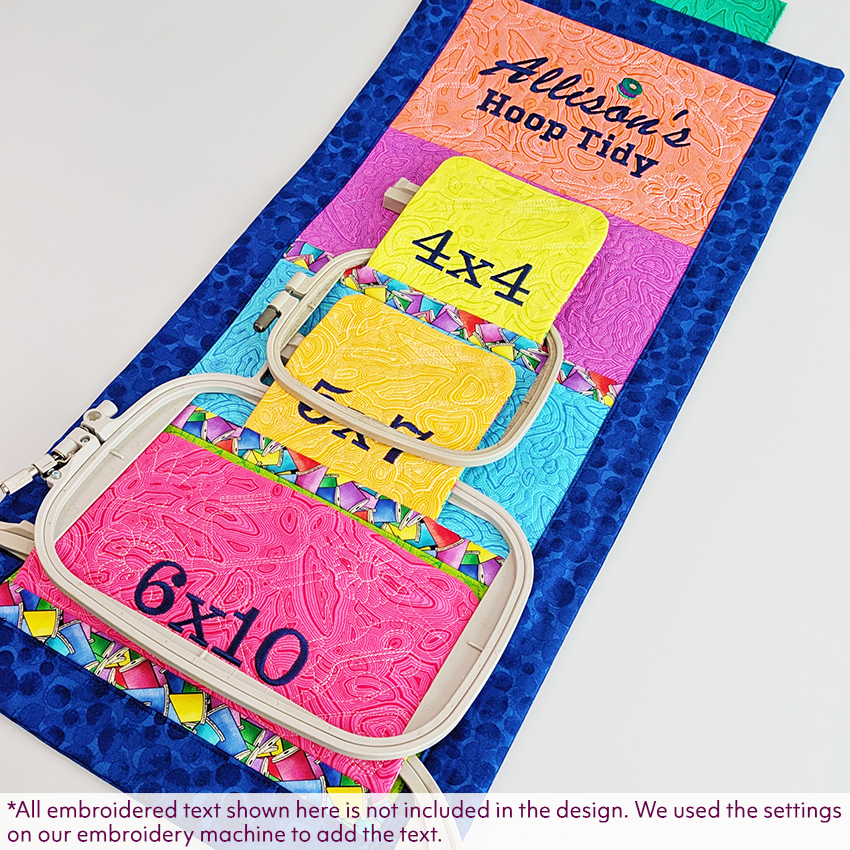 Colourful hoop tidy with embroidery hoops and text added