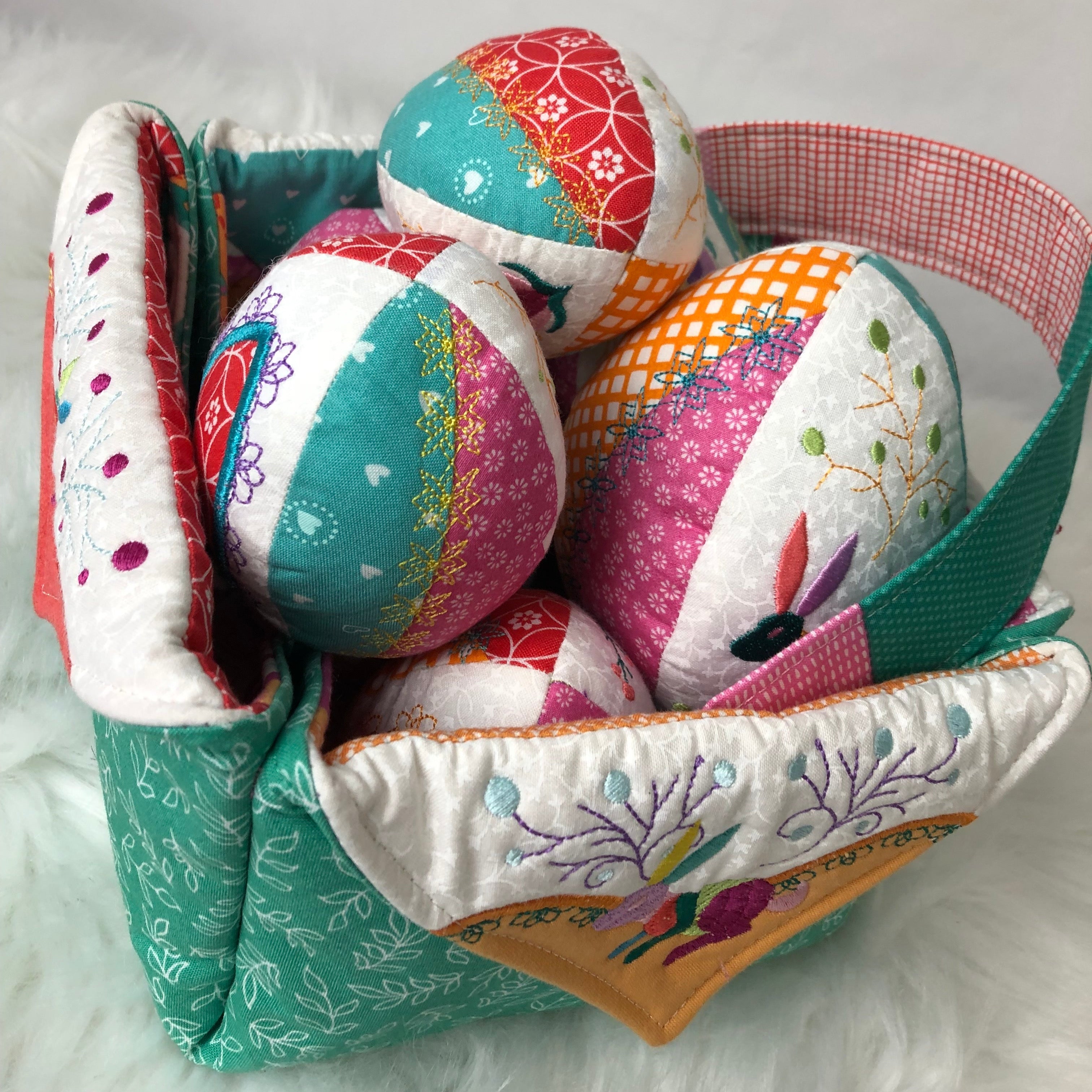 Colorful stuffed easter eggs in a decorative basket