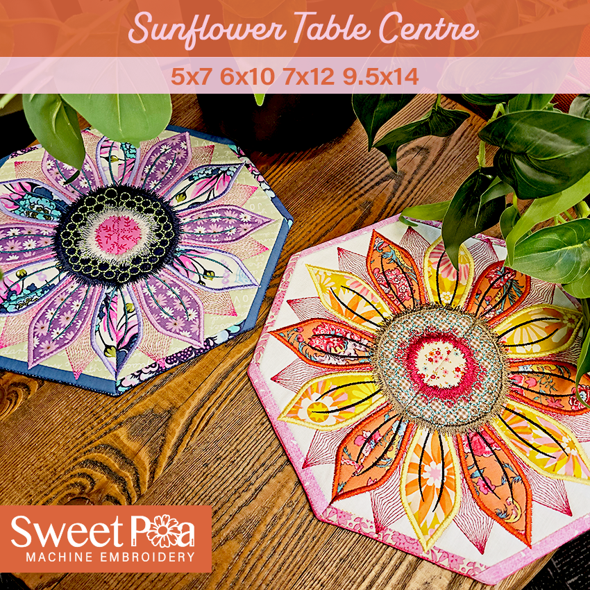 Two sunflower table centres on a wooden surface with 'Sweet Pea Machine Embroidery' branding.