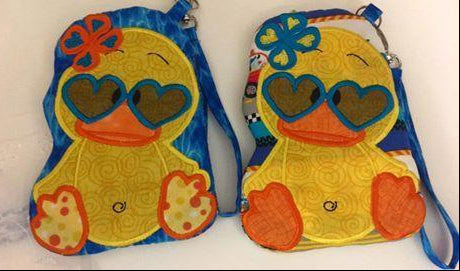 Unicef Charity Duck Zipper Purse 5x7 and 6x10 - Sweet Pea Australia In the hoop machine embroidery designs. in the hoop project, in the hoop embroidery designs, craft in the hoop project, diy in the hoop project, diy craft in the hoop project, in the hoop embroidery patterns, design in the hoop patterns, embroidery designs for in the hoop embroidery projects, best in the hoop machine embroidery designs perfect for all hoops and embroidery machines