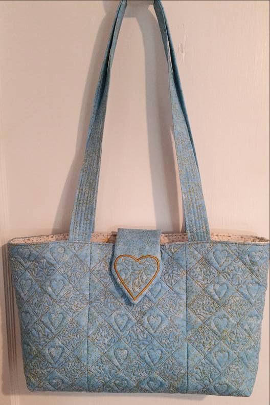 Quilted Diamonds Bag 5x7 6x10 7x12 - Sweet Pea Australia In the hoop machine embroidery designs. in the hoop project, in the hoop embroidery designs, craft in the hoop project, diy in the hoop project, diy craft in the hoop project, in the hoop embroidery patterns, design in the hoop patterns, embroidery designs for in the hoop embroidery projects, best in the hoop machine embroidery designs perfect for all hoops and embroidery machines