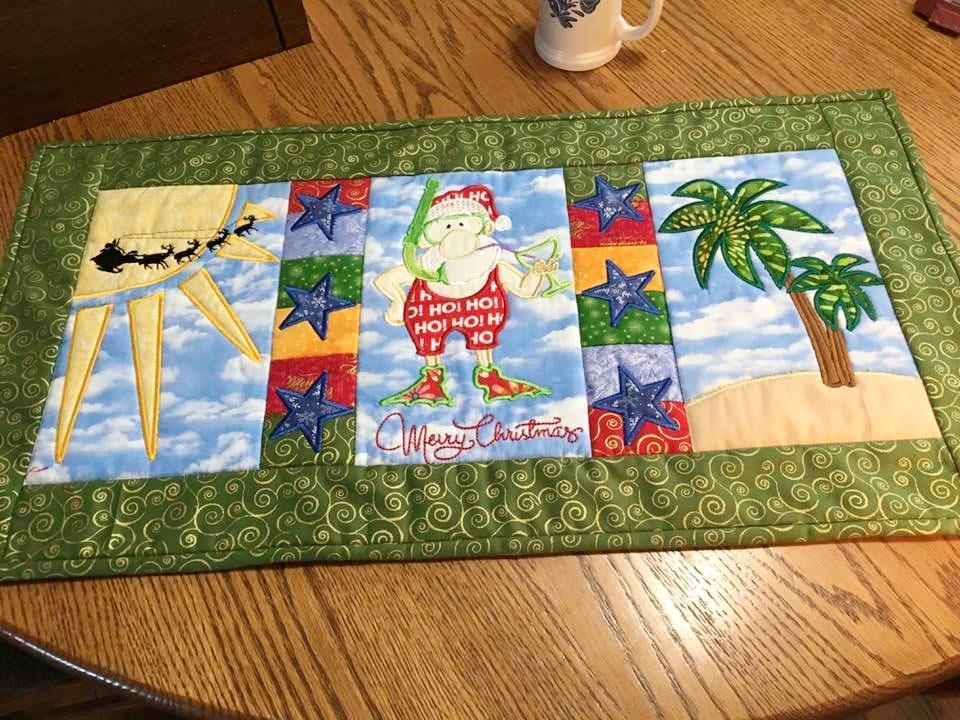 Summer Santa Table Runner 5x7 6x10 8x12 - Sweet Pea Australia In the hoop machine embroidery designs. in the hoop project, in the hoop embroidery designs, craft in the hoop project, diy in the hoop project, diy craft in the hoop project, in the hoop embroidery patterns, design in the hoop patterns, embroidery designs for in the hoop embroidery projects, best in the hoop machine embroidery designs perfect for all hoops and embroidery machines