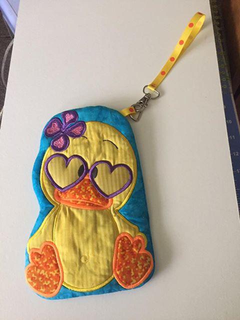 Unicef Charity Duck Zipper Purse 5x7 and 6x10 - Sweet Pea Australia In the hoop machine embroidery designs. in the hoop project, in the hoop embroidery designs, craft in the hoop project, diy in the hoop project, diy craft in the hoop project, in the hoop embroidery patterns, design in the hoop patterns, embroidery designs for in the hoop embroidery projects, best in the hoop machine embroidery designs perfect for all hoops and embroidery machines