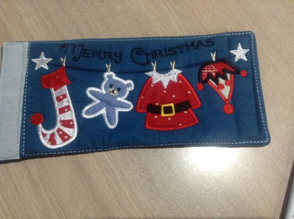 Christmas Elf bottle wrap or stubbie cooler 5x7 and 6x10 - Sweet Pea Australia In the hoop machine embroidery designs. in the hoop project, in the hoop embroidery designs, craft in the hoop project, diy in the hoop project, diy craft in the hoop project, in the hoop embroidery patterns, design in the hoop patterns, embroidery designs for in the hoop embroidery projects, best in the hoop machine embroidery designs perfect for all hoops and embroidery machines