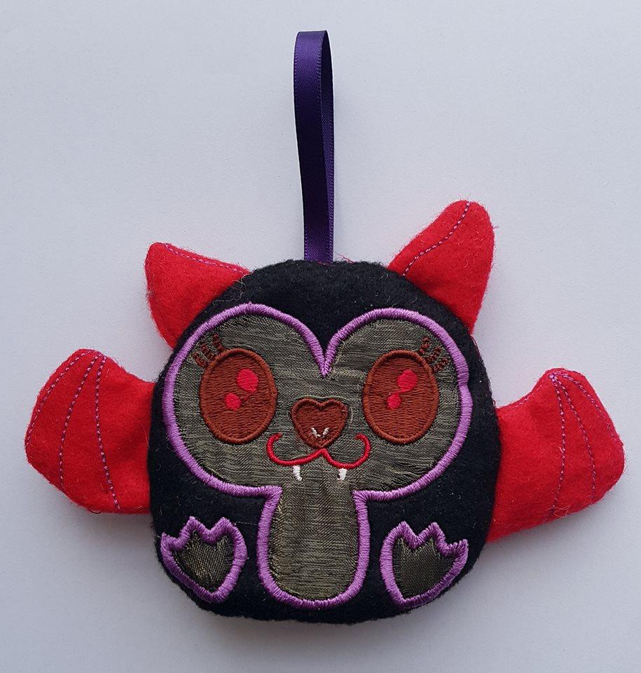 Vampire Bat Zipper Purse 4x4 5x5 - Sweet Pea Australia In the hoop machine embroidery designs. in the hoop project, in the hoop embroidery designs, craft in the hoop project, diy in the hoop project, diy craft in the hoop project, in the hoop embroidery patterns, design in the hoop patterns, embroidery designs for in the hoop embroidery projects, best in the hoop machine embroidery designs perfect for all hoops and embroidery machines