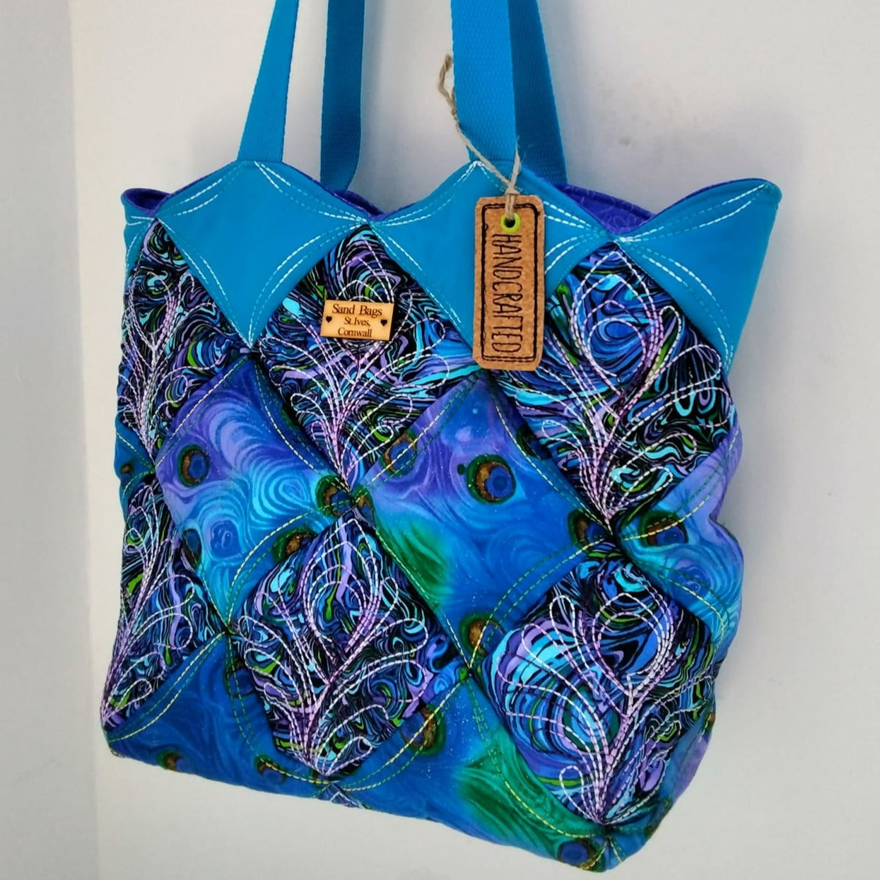 Peacock Quilt Blocks and Bag 4x4 5x5 - Sweet Pea Australia In the hoop machine embroidery designs. in the hoop project, in the hoop embroidery designs, craft in the hoop project, diy in the hoop project, diy craft in the hoop project, in the hoop embroidery patterns, design in the hoop patterns, embroidery designs for in the hoop embroidery projects, best in the hoop machine embroidery designs perfect for all hoops and embroidery machines