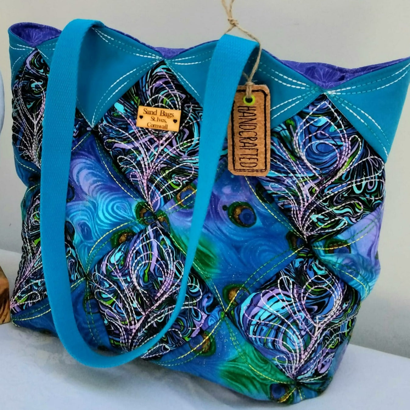 Peacock Quilt Blocks and Bag 4x4 5x5 - Sweet Pea Australia In the hoop machine embroidery designs. in the hoop project, in the hoop embroidery designs, craft in the hoop project, diy in the hoop project, diy craft in the hoop project, in the hoop embroidery patterns, design in the hoop patterns, embroidery designs for in the hoop embroidery projects, best in the hoop machine embroidery designs perfect for all hoops and embroidery machines