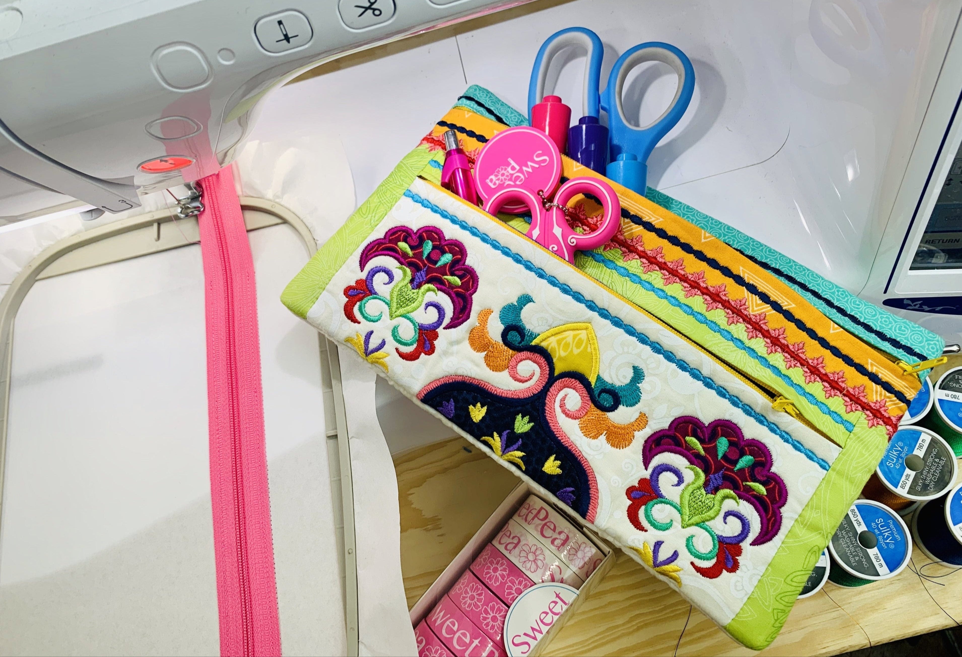 Folk Art Zipper Purse 5x7 6x10 and 7x12 - Sweet Pea Australia In the hoop machine embroidery designs. in the hoop project, in the hoop embroidery designs, craft in the hoop project, diy in the hoop project, diy craft in the hoop project, in the hoop embroidery patterns, design in the hoop patterns, embroidery designs for in the hoop embroidery projects, best in the hoop machine embroidery designs perfect for all hoops and embroidery machines