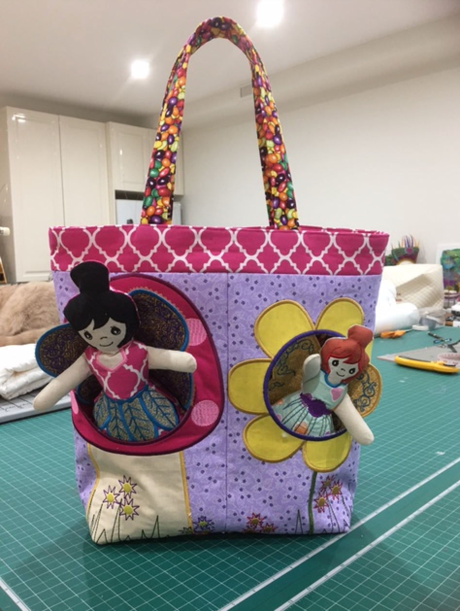 Fairy Pocket Bag 5x7 6x10 8x12 - Sweet Pea Australia In the hoop machine embroidery designs. in the hoop project, in the hoop embroidery designs, craft in the hoop project, diy in the hoop project, diy craft in the hoop project, in the hoop embroidery patterns, design in the hoop patterns, embroidery designs for in the hoop embroidery projects, best in the hoop machine embroidery designs perfect for all hoops and embroidery machines