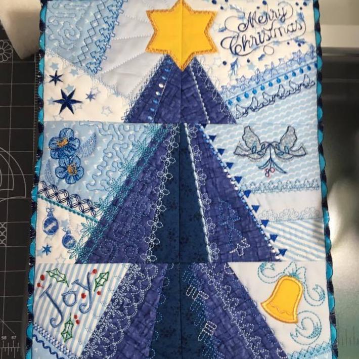 Patchwork Christmas Tree Wall Hanging / Runner 4x4 5x5 6x6 - Sweet Pea Australia In the hoop machine embroidery designs. in the hoop project, in the hoop embroidery designs, craft in the hoop project, diy in the hoop project, diy craft in the hoop project, in the hoop embroidery patterns, design in the hoop patterns, embroidery designs for in the hoop embroidery projects, best in the hoop machine embroidery designs perfect for all hoops and embroidery machines