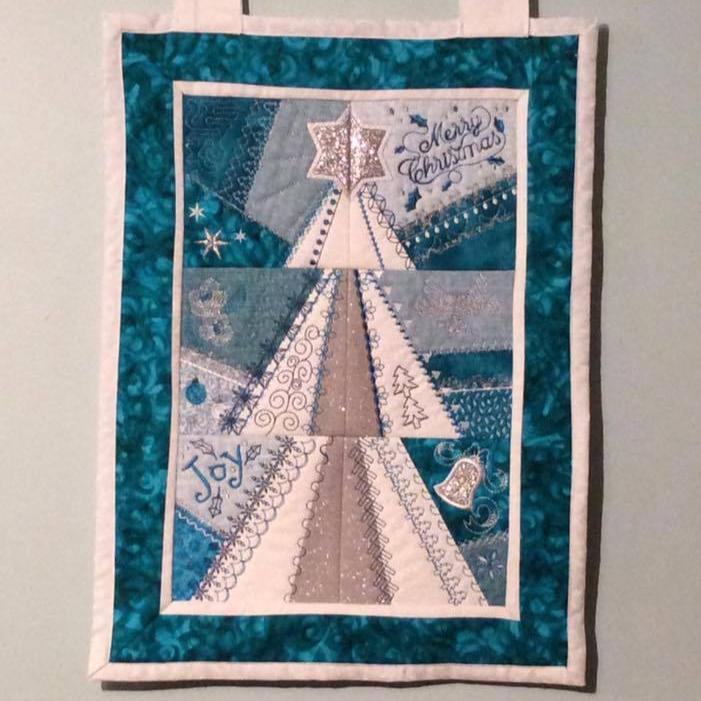 Patchwork Christmas Tree Wall Hanging / Runner 4x4 5x5 6x6 - Sweet Pea Australia In the hoop machine embroidery designs. in the hoop project, in the hoop embroidery designs, craft in the hoop project, diy in the hoop project, diy craft in the hoop project, in the hoop embroidery patterns, design in the hoop patterns, embroidery designs for in the hoop embroidery projects, best in the hoop machine embroidery designs perfect for all hoops and embroidery machines