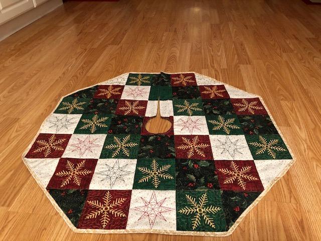 Snowflake Tree Skirt 5x5 - Sweet Pea Australia In the hoop machine embroidery designs. in the hoop project, in the hoop embroidery designs, craft in the hoop project, diy in the hoop project, diy craft in the hoop project, in the hoop embroidery patterns, design in the hoop patterns, embroidery designs for in the hoop embroidery projects, best in the hoop machine embroidery designs perfect for all hoops and embroidery machines