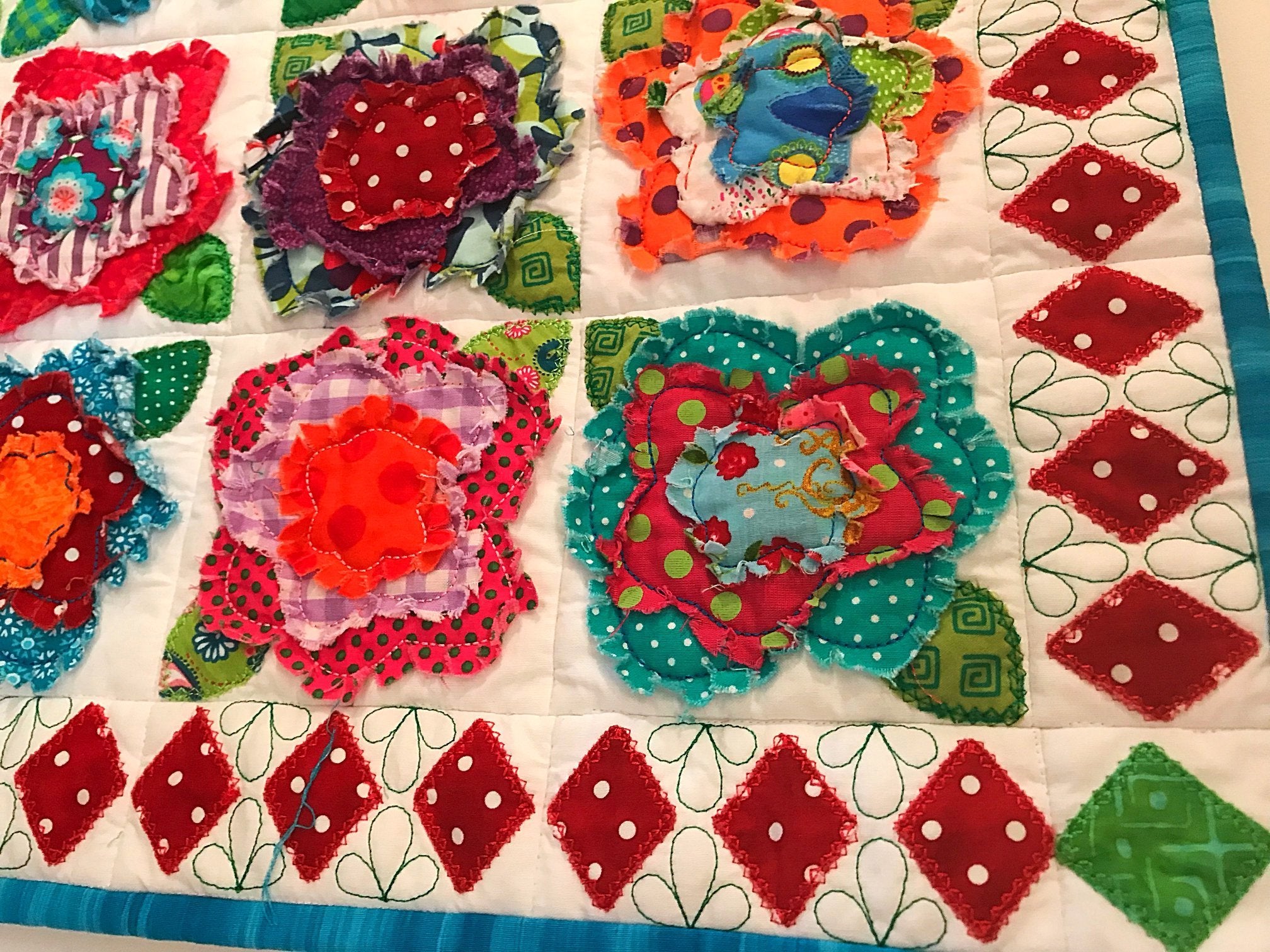 Shaggy Roses Quilt 4x4 5x5 6x6 7x7 - Sweet Pea Australia In the hoop machine embroidery designs. in the hoop project, in the hoop embroidery designs, craft in the hoop project, diy in the hoop project, diy craft in the hoop project, in the hoop embroidery patterns, design in the hoop patterns, embroidery designs for in the hoop embroidery projects, best in the hoop machine embroidery designs perfect for all hoops and embroidery machines