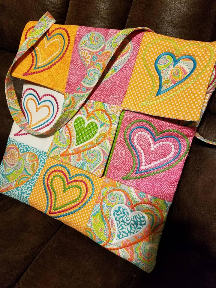 Heart Patchwork Bag 4x4 5x5 - Sweet Pea Australia In the hoop machine embroidery designs. in the hoop project, in the hoop embroidery designs, craft in the hoop project, diy in the hoop project, diy craft in the hoop project, in the hoop embroidery patterns, design in the hoop patterns, embroidery designs for in the hoop embroidery projects, best in the hoop machine embroidery designs perfect for all hoops and embroidery machines