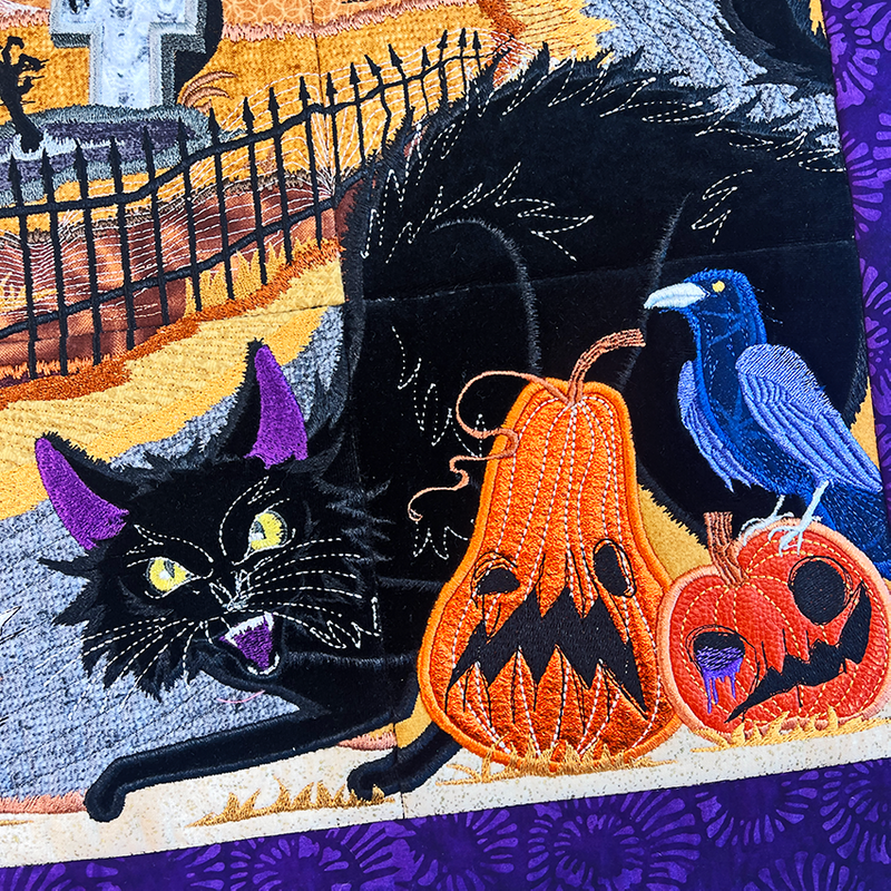 A Haunting Scene mini quilt cat and pumpkins