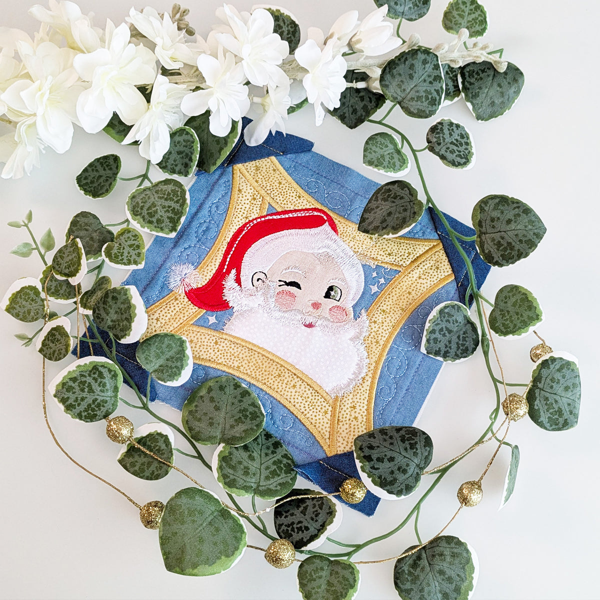 santa block in 2026 christmas bow styled with white and gold