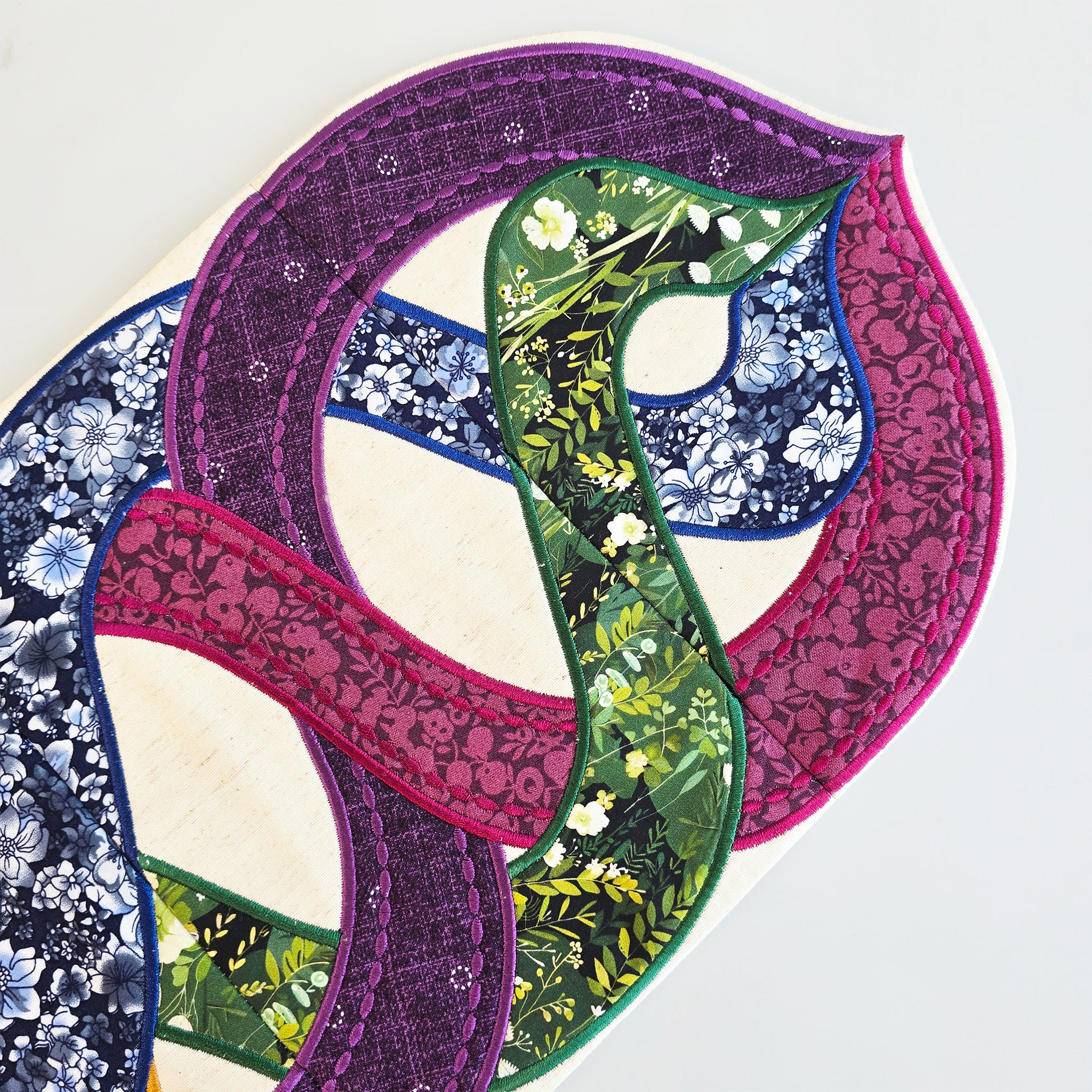 close up of colourful celtic braids sample with no redwork