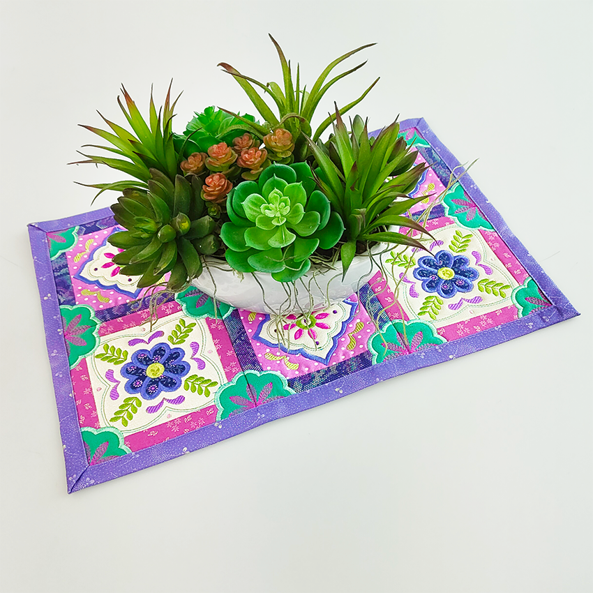 Decorative Tile Placemat In the Hoop Design with plant