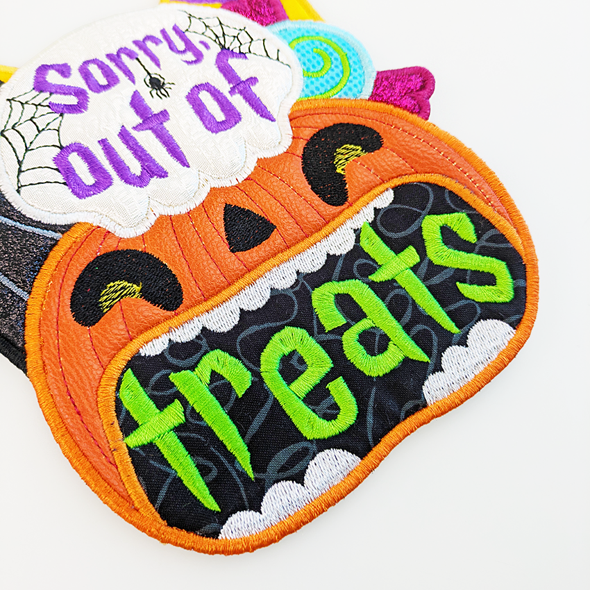 Halloween Doorhanger Our of Treats close up 2