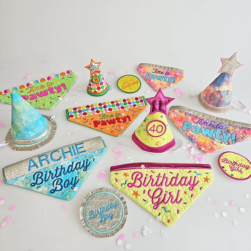 Collection of colorful birthday-themed machine embroidered accessories on a light background