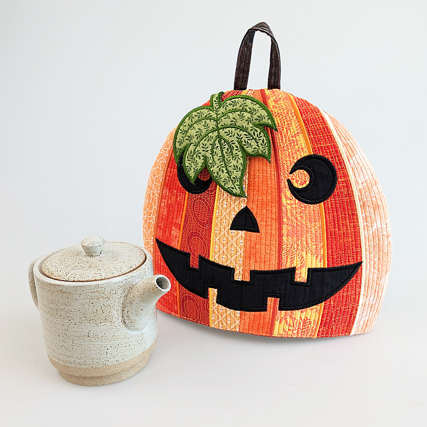 Jack o lantern teapot cosy styled