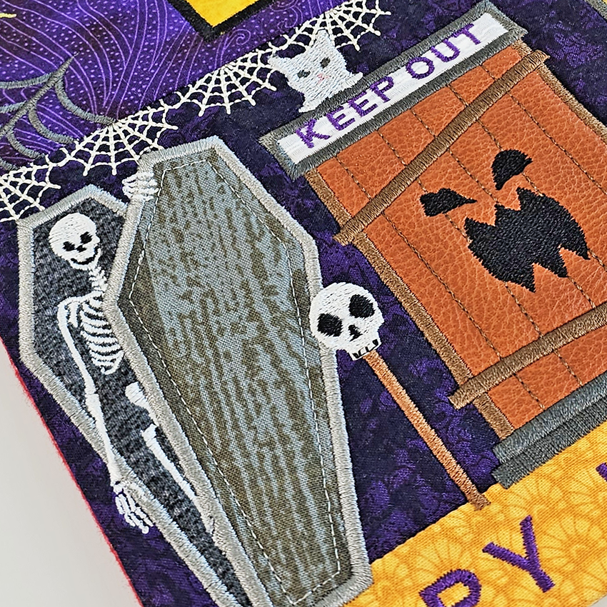 Reversible Halloween Christmas House Hanger close up