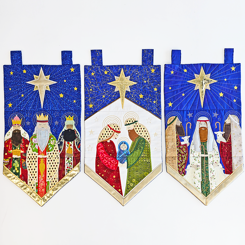 Three nativity scene wall hangings with the Three Wise Men, baby Jesus, Three Shepherds all by Sweet Pea