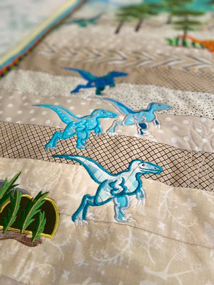 Dinosaur in the Cretaceous (Floating) Quilt 5x7 - Sweet Pea Australia In the hoop machine embroidery designs. in the hoop project, in the hoop embroidery designs, craft in the hoop project, diy in the hoop project, diy craft in the hoop project, in the hoop embroidery patterns, design in the hoop patterns, embroidery designs for in the hoop embroidery projects, best in the hoop machine embroidery designs perfect for all hoops and embroidery machines