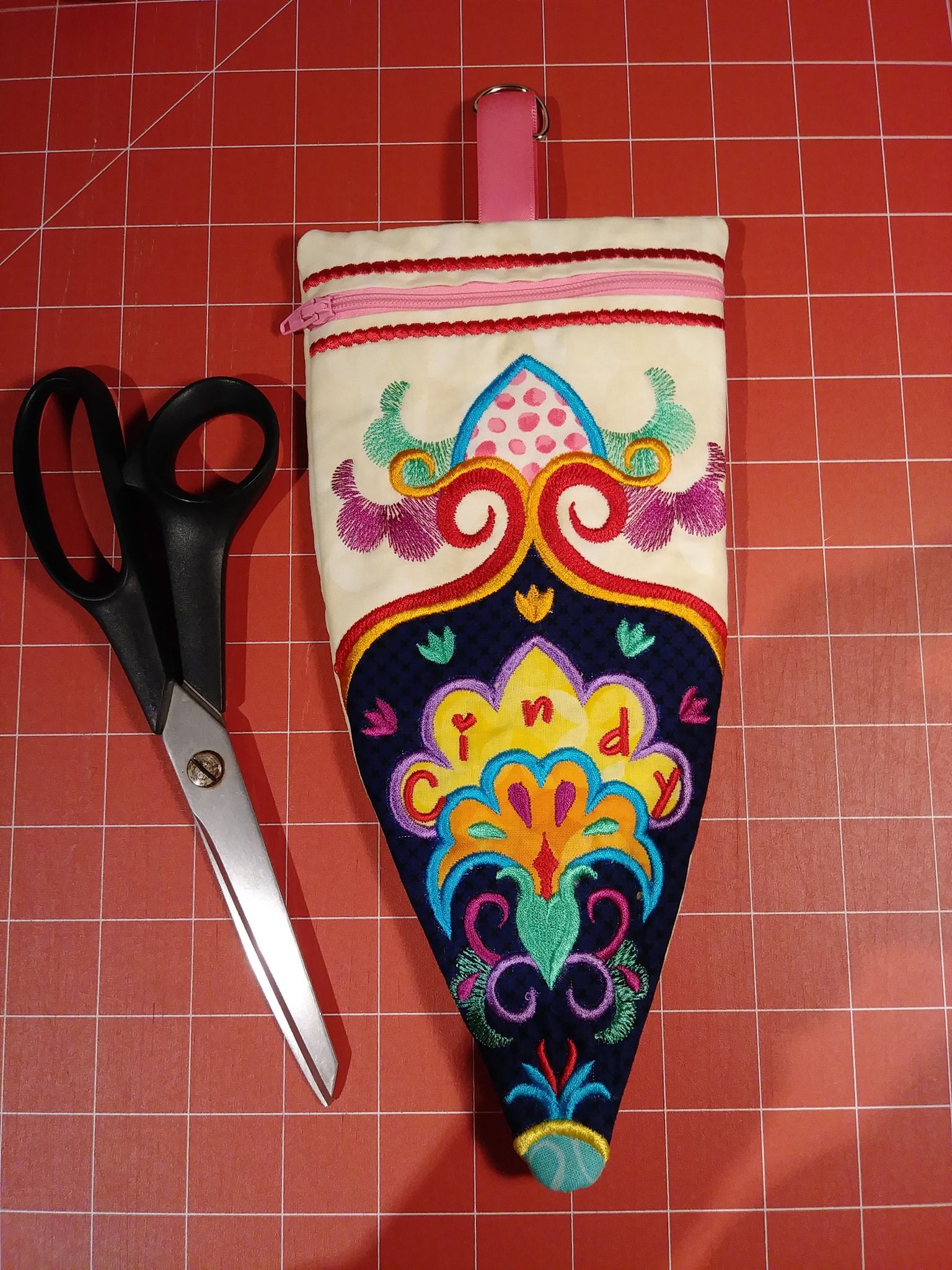 Free Embroidered Scissors Zipper Case 5x7 7x12 - Sweet Pea Australia In the hoop machine embroidery designs. in the hoop project, in the hoop embroidery designs, craft in the hoop project, diy in the hoop project, diy craft in the hoop project, in the hoop embroidery patterns, design in the hoop patterns, embroidery designs for in the hoop embroidery projects, best in the hoop machine embroidery designs perfect for all hoops and embroidery machines