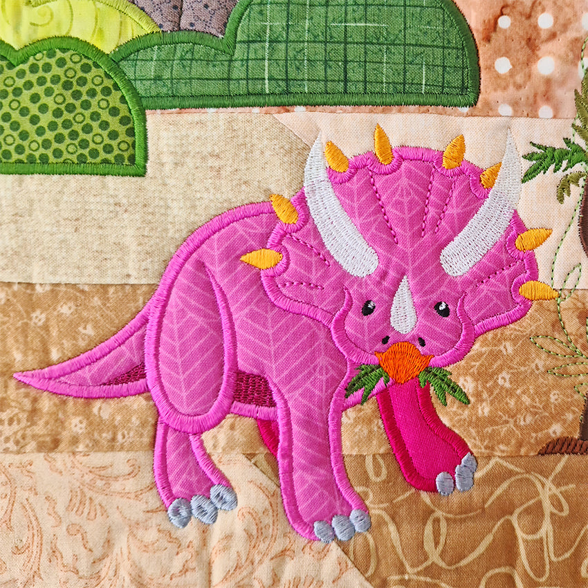 Dinosaur in the Cretaceous (Floating) Quilt 5x7 - Sweet Pea Australia In the hoop machine embroidery designs. in the hoop project, in the hoop embroidery designs, craft in the hoop project, diy in the hoop project, diy craft in the hoop project, in the hoop embroidery patterns, design in the hoop patterns, embroidery designs for in the hoop embroidery projects, best in the hoop machine embroidery designs perfect for all hoops and embroidery machines