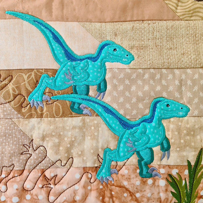 Dinosaur in the Cretaceous (Floating) Quilt 5x7 - Sweet Pea Australia In the hoop machine embroidery designs. in the hoop project, in the hoop embroidery designs, craft in the hoop project, diy in the hoop project, diy craft in the hoop project, in the hoop embroidery patterns, design in the hoop patterns, embroidery designs for in the hoop embroidery projects, best in the hoop machine embroidery designs perfect for all hoops and embroidery machines