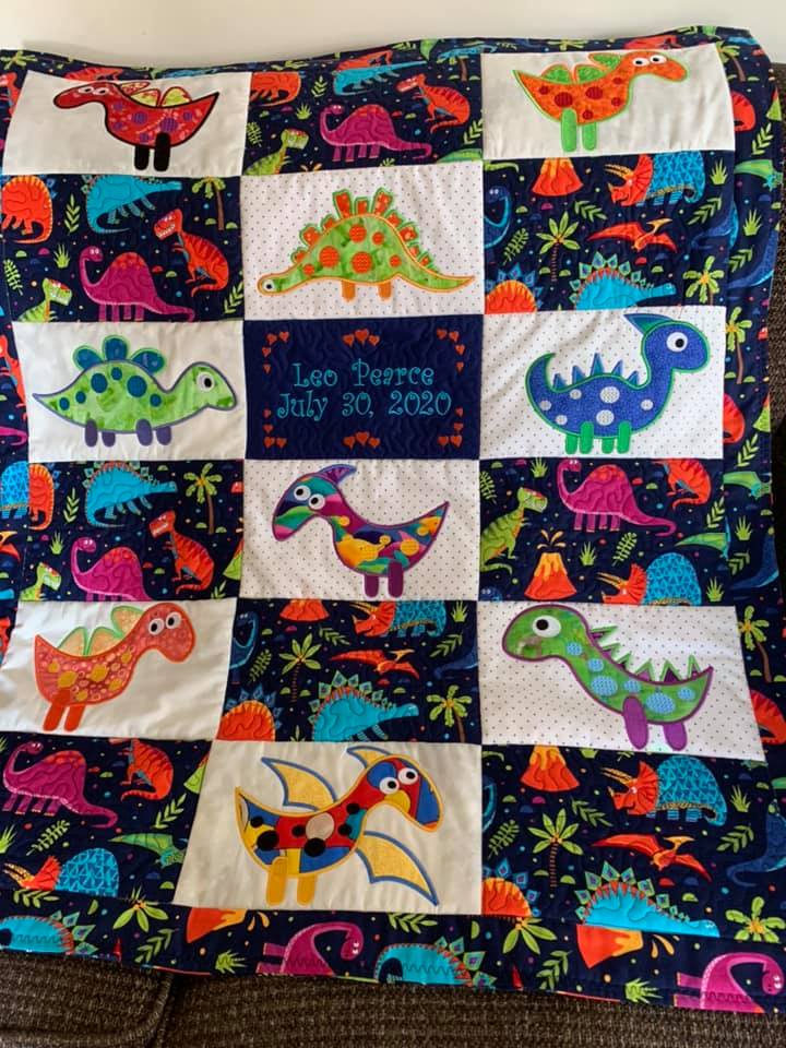 Dinosaur quilt 5x7 6x10 8x12 - Sweet Pea Australia In the hoop machine embroidery designs. in the hoop project, in the hoop embroidery designs, craft in the hoop project, diy in the hoop project, diy craft in the hoop project, in the hoop embroidery patterns, design in the hoop patterns, embroidery designs for in the hoop embroidery projects, best in the hoop machine embroidery designs perfect for all hoops and embroidery machines