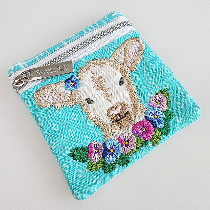 lamb zipper purse ith design