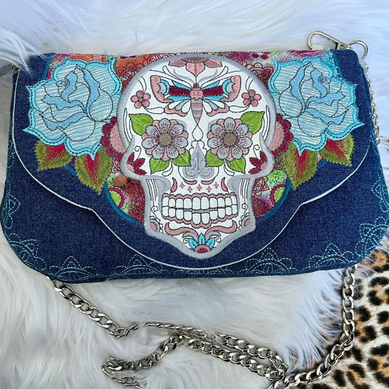 Sugar Skull Clutch with Zipper 5x7 6x10 7x12 9.5x14 - Sweet Pea Australia In the hoop machine embroidery designs. in the hoop project, in the hoop embroidery designs, craft in the hoop project, diy in the hoop project, diy craft in the hoop project, in the hoop embroidery patterns, design in the hoop patterns, embroidery designs for in the hoop embroidery projects, best in the hoop machine embroidery designs perfect for all hoops and embroidery machines