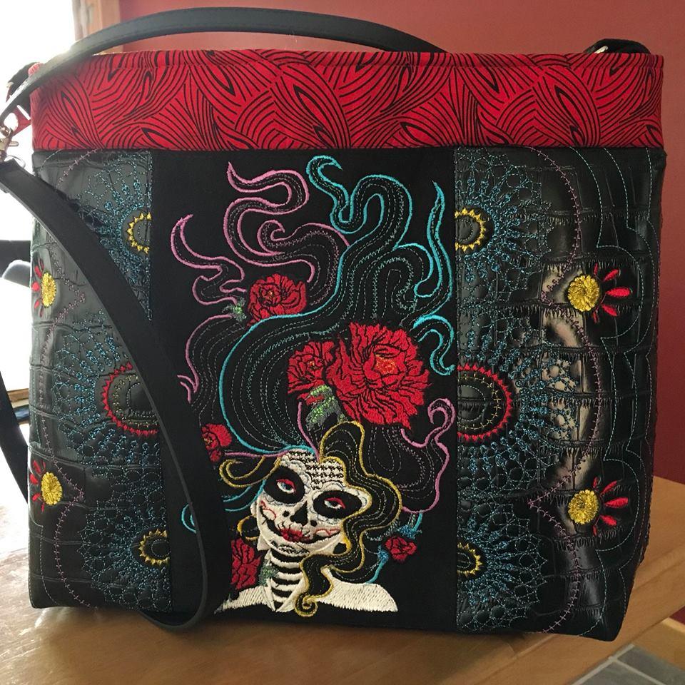 Day of the Dead laptop bag 5x7 6x10 7x12 - Sweet Pea Australia In the hoop machine embroidery designs. in the hoop project, in the hoop embroidery designs, craft in the hoop project, diy in the hoop project, diy craft in the hoop project, in the hoop embroidery patterns, design in the hoop patterns, embroidery designs for in the hoop embroidery projects, best in the hoop machine embroidery designs perfect for all hoops and embroidery machines