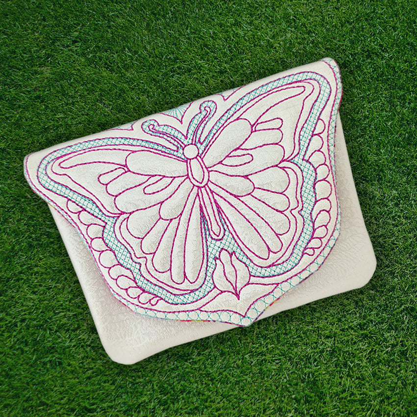 Butterfly Trapunto Pouch 6x10 7x12 8x12 9.5x14 - Sweet Pea Australia In the hoop machine embroidery designs. in the hoop project, in the hoop embroidery designs, craft in the hoop project, diy in the hoop project, diy craft in the hoop project, in the hoop embroidery patterns, design in the hoop patterns, embroidery designs for in the hoop embroidery projects, best in the hoop machine embroidery designs perfect for all hoops and embroidery machines